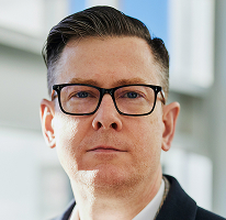 Alexander Hughes, administrerende direktør i et kryptohandelsselskap, portrett